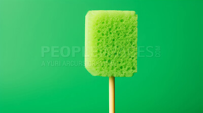 Buy stock photo Sponge on a stick. Clean home and kitchen copyspace background