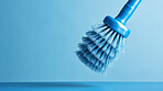 Round blue brush. Clean home and kitchen copyspace background