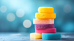 Stack of colorful sponges. Clean home and kitchen copyspace background