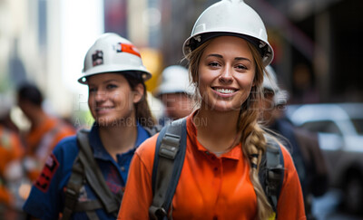 Professional woman engineers smiling on construction site. Female empowerment.
