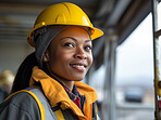 Portrait of woman construction worker. Professional engineer or artisan. Female empowerment.