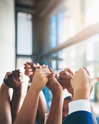 Buy stock photo Cropped shot of a group of businesspeople holding hands