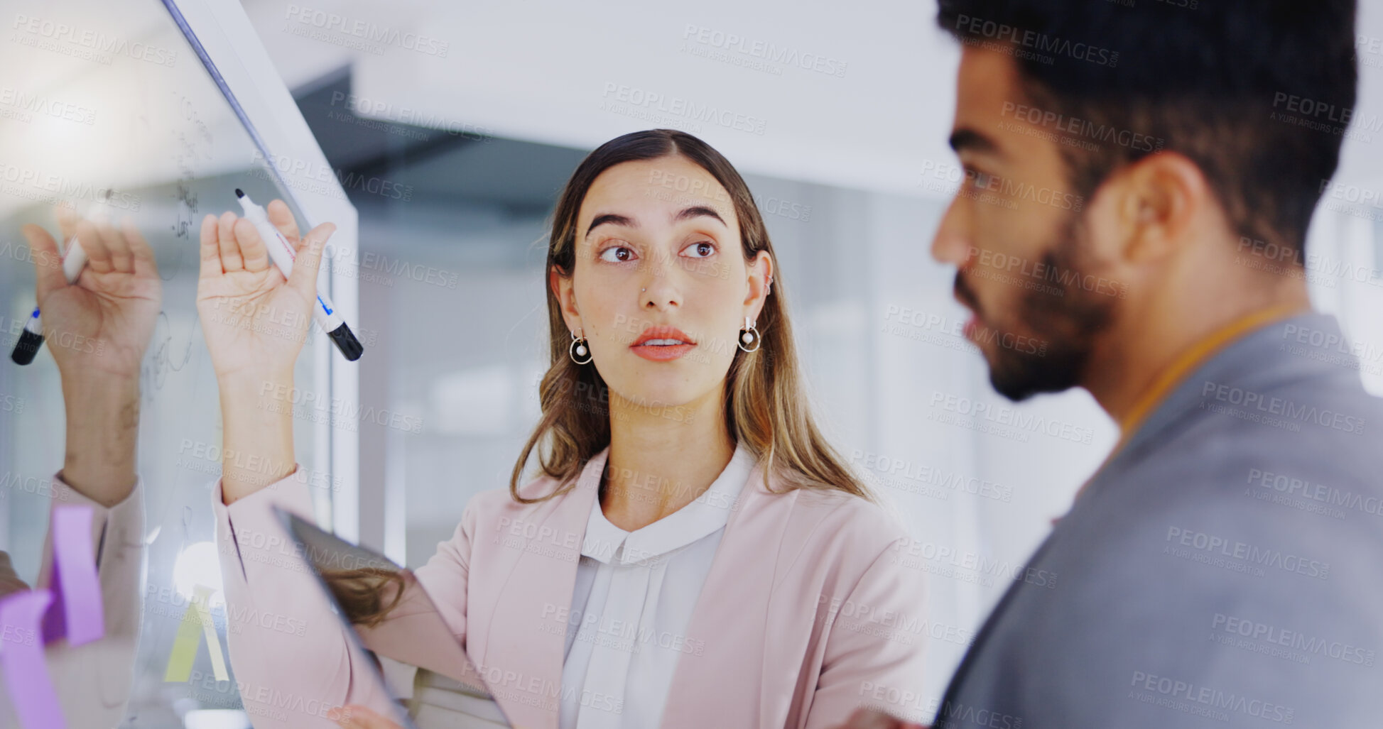 Buy stock photo Business people, glass board and partnership for writing, sticky note or tablet for talk, teamwork or planning. Businessman, female partner and moodboard for goal, ideas or brainstorming for strategy