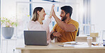 Creative business people, laptop and high five for winning, success or planning together in teamwork at office. Happy man and woman touching hands on touchscreen for team collaboration or achievement
