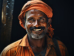 Happy Indian construction site worker looking at camera smiling. Construction concept.