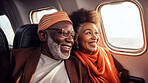 Mature couple on first class private jet. Luxury vacation travel concept.