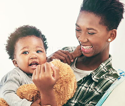 Buy stock photo Shot of a little baby boy at home with his mom