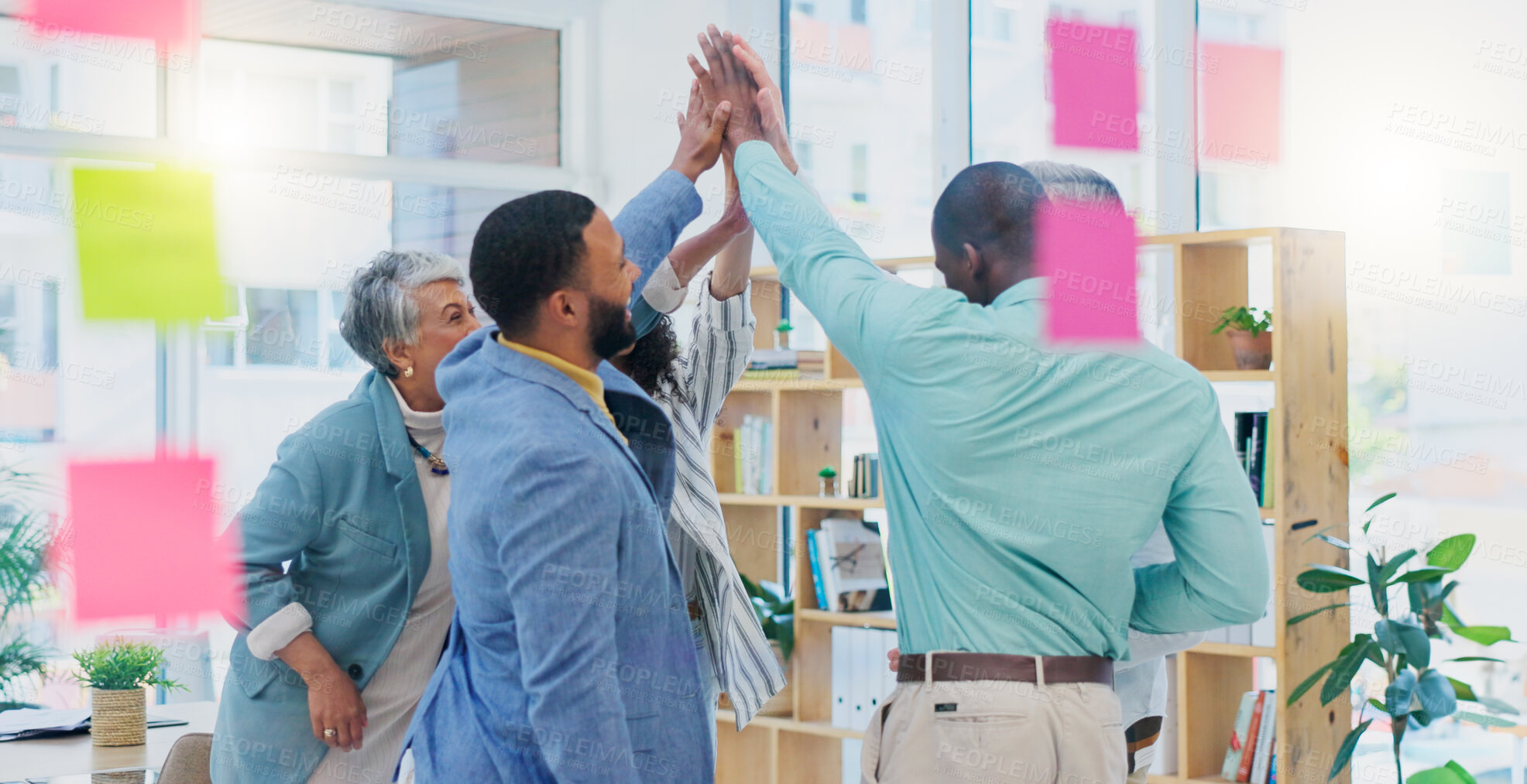 Buy stock photo Creative people, high five and applause in celebration for team building, achievement or success at office. Group of happy employees clapping for teamwork, winning or meeting in startup at workplace