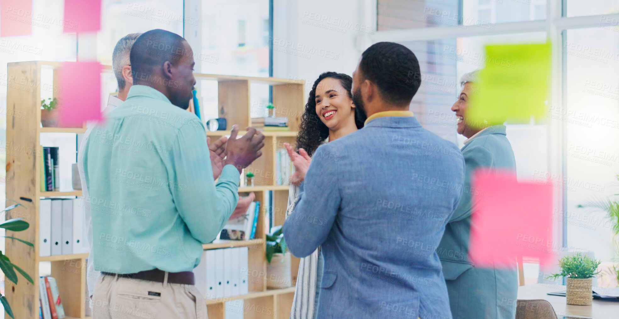 Buy stock photo Creative people, meeting and applause in celebration for winning, team achievement or unity at the office. Group of happy employees clapping in success for teamwork, promotion or startup at workplace