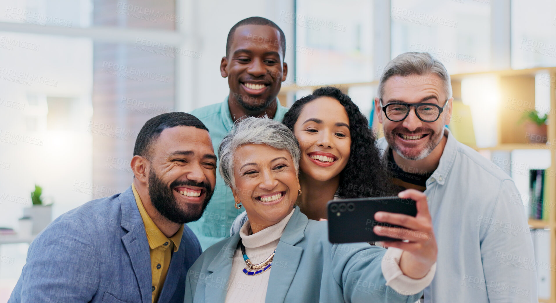 Buy stock photo Happy creative group, selfie and team building in meeting for photo, memory or vlog at the office. Goofy, silly or humor people in teamwork with smile for funny picture or social media at business workplace