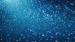 Blue glitter sparkling shiny wrapping paper background. Wallpaper decoration