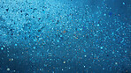 Blue glitter sparkling shiny wrapping paper background. Wallpaper decoration