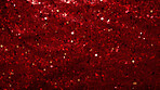 Red glitter sparkling shiny wrapping paper background. Wallpaper decoration