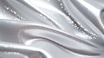 Silver glitter wave material. Metallic textile design background