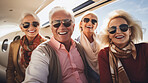 Mature friend group on first class private jet. Luxury vacation travel concept.