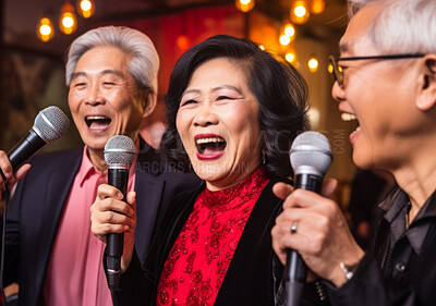 Senior friend group singing karaoke. Fun retirement birthday activity