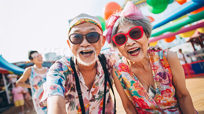 Buy stock photo Senior couple at amusement park. Rides, food, fun retirement activity