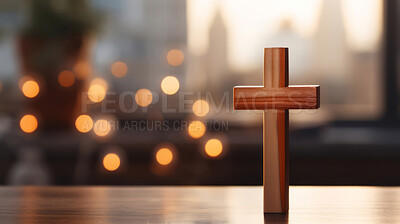 Buy stock photo Close up of small wooden cross on table. Copy space. Religion and faith concept.