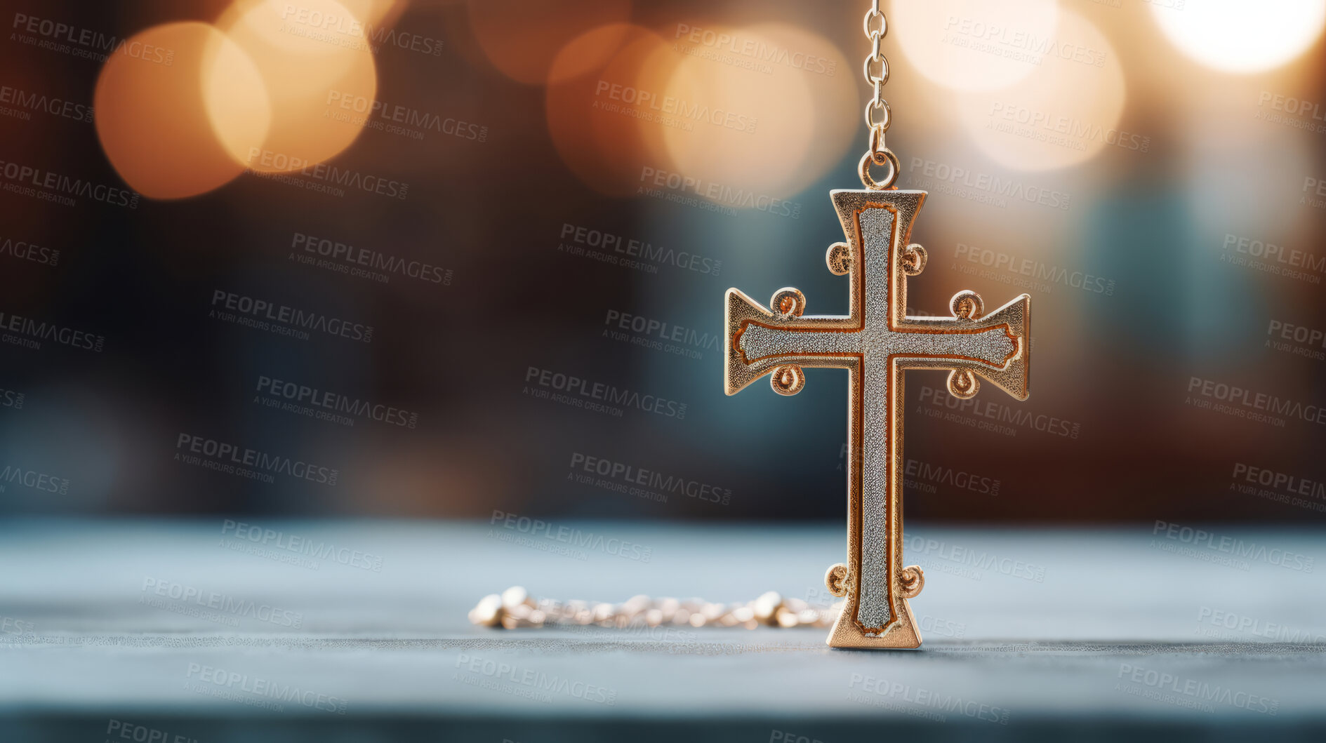 Buy stock photo Close up of small cross hanging from chain on table. Copy space. Religion and faith concept.