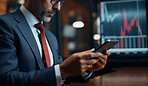 Businessman holding smartphone. Stock trade, financial concept.