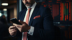 Businessman holding smartphone. Stock trade, financial concept.