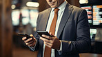 Businessman holding smartphone. Stock trade, financial concept.