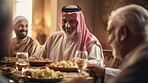 Arab friends and family at dinner party. Active holiday fun, bonding and retirement