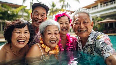 Senior friends in swimming pool. Active holiday fun, fitness and longevity