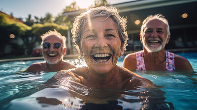 Senior friends in swimming pool. Active holiday fun, fitness and longevity