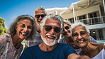 Senior friends by hotel pool. Active holiday fun, fitness and longevity