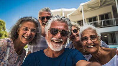Senior friends by hotel pool. Active holiday fun, fitness and longevity