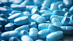 Blue pills background. Health supplement and science medicine research concept