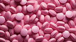 Pink pills background. Health supplement and science medicine research concept