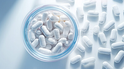 White pills in glass container. Health supplement and science medicine research concept
