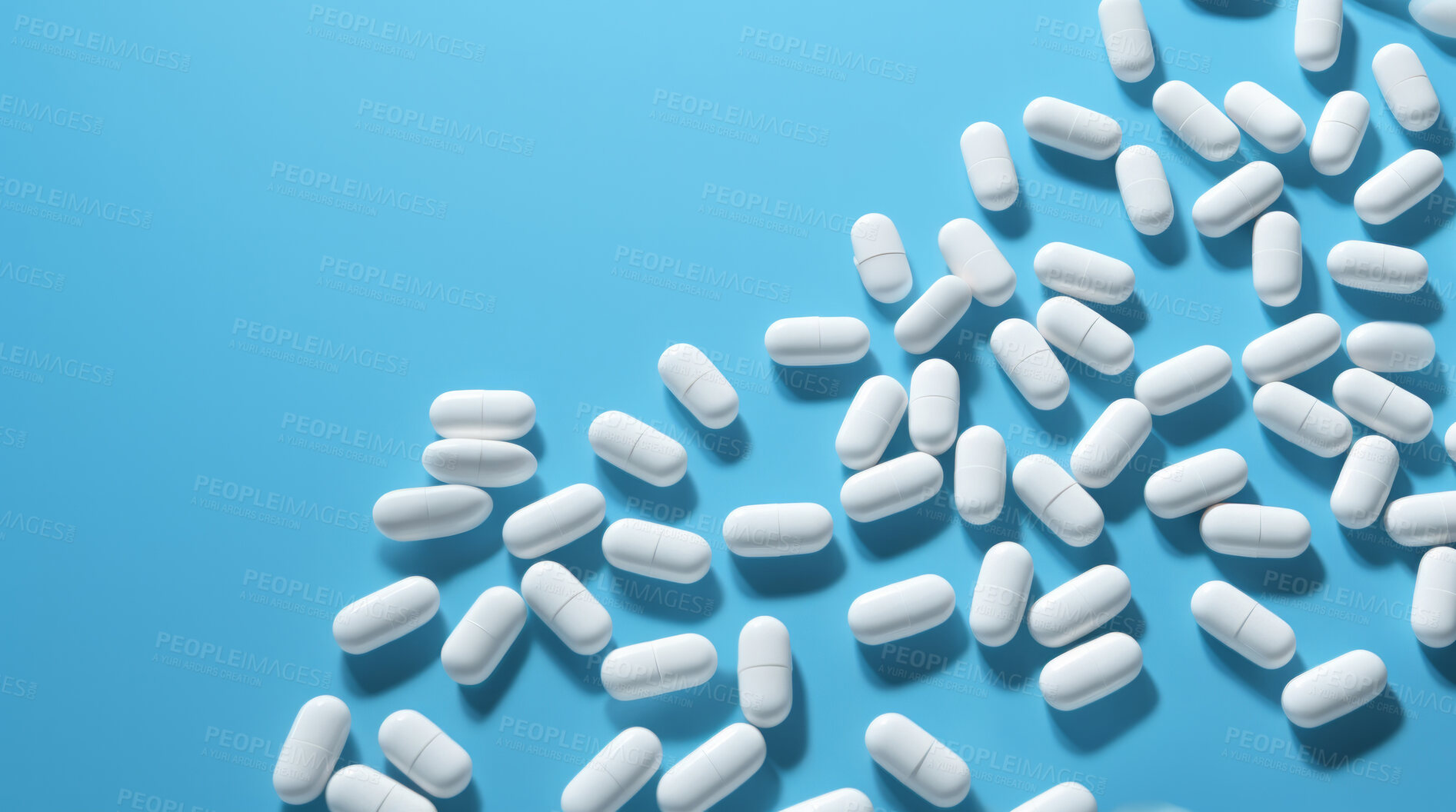 Buy stock photo White pills on blue background. Health supplement and science medicine research concept