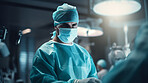 Surgeon or doctor in the operating hospital room -performing an operation