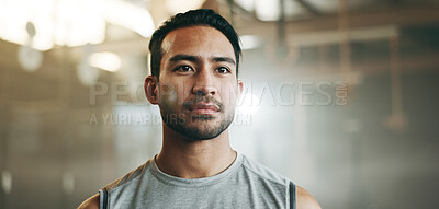Thinking, serious and a man at the gym for fitness, exercise idea or health. Motivation, sports and an Asian athlete or person planning at a club for training, wellness or cardio for a routine