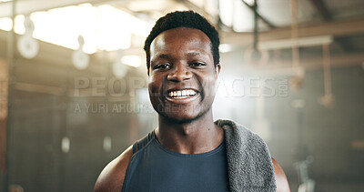 Happy, fitness and face of black man at a gym for training, exercise and athletics routine. Smile, portrait and African male personal trainer at sports studio for workout, progress and body challenge