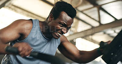 Buy stock photo Black man, fitness and cycling at gym in cardio workout, exercise or intense training on machine. African male person on bicycle equipment in sweat or running for muscle, endurance or stamina at club