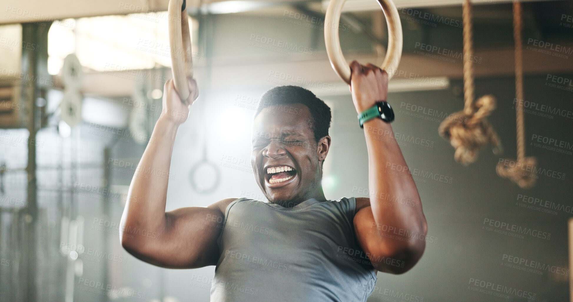 Buy stock photo Gym, intense gymnastics and black man doing pull up exercise, arm muscle building or bodybuilding for strength training. Determined, athlete and African person doing fitness, challenge or workout