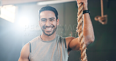 Buy stock photo Fitness, gym and face of man with rope for training, bodybuilder exercise and intense workout. Sport, personal trainer and portrait of happy person with equipment for wellness, performance and muscle