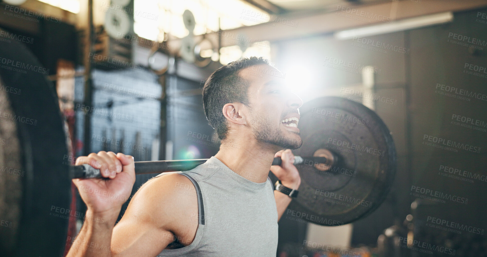 Buy stock photo Man at gym, weight lifting and barbell with focus on muscle building endurance, strong body and balance power in fitness. Commitment, motivation and bodybuilder in workout for health and wellness.