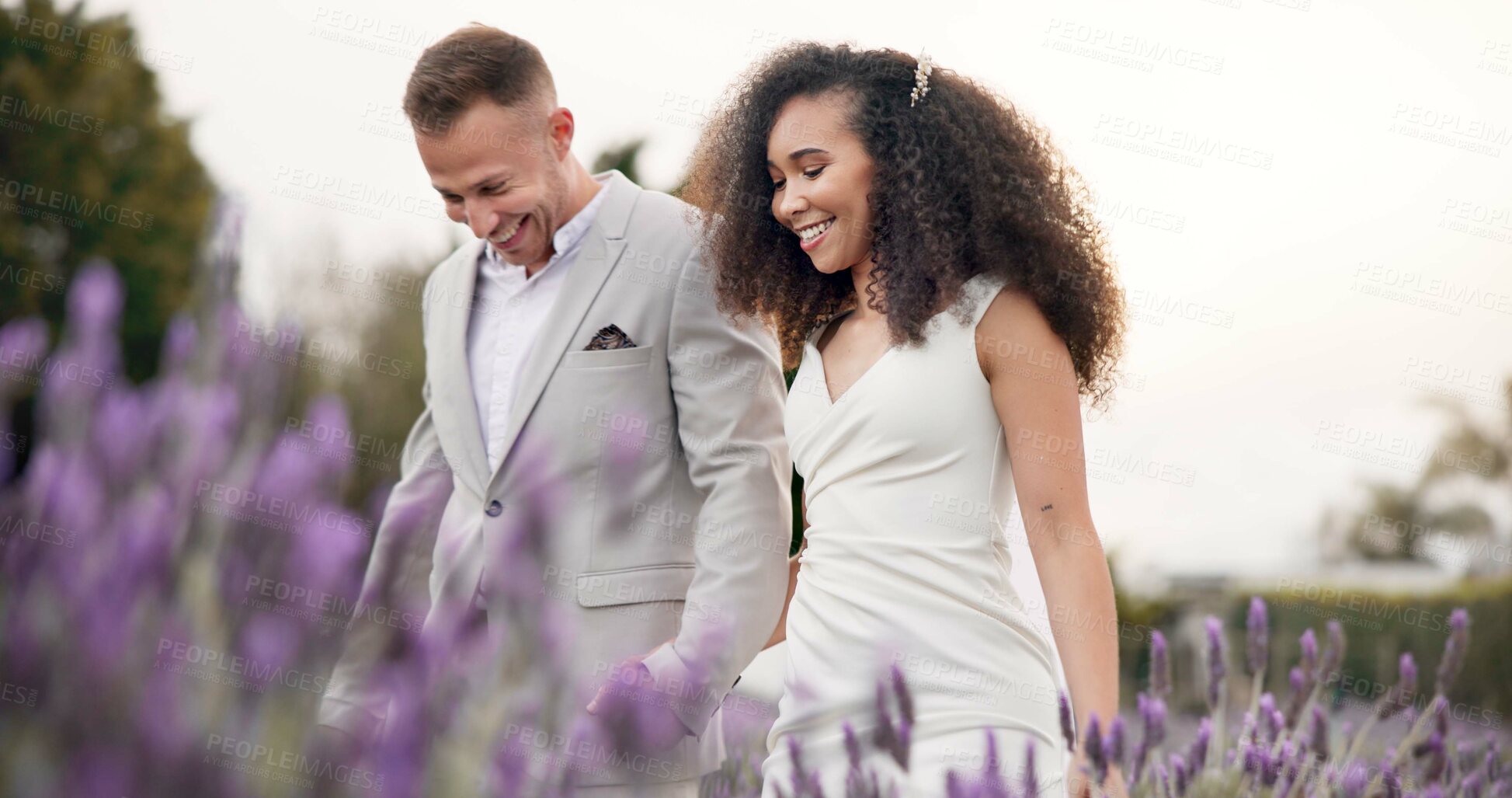Buy stock photo Wedding, bride and groom holding hands in meadow, celebrate love with happiness and commitment. Marriage, trust and people in interracial relationship, event and nature with love and care outdoor