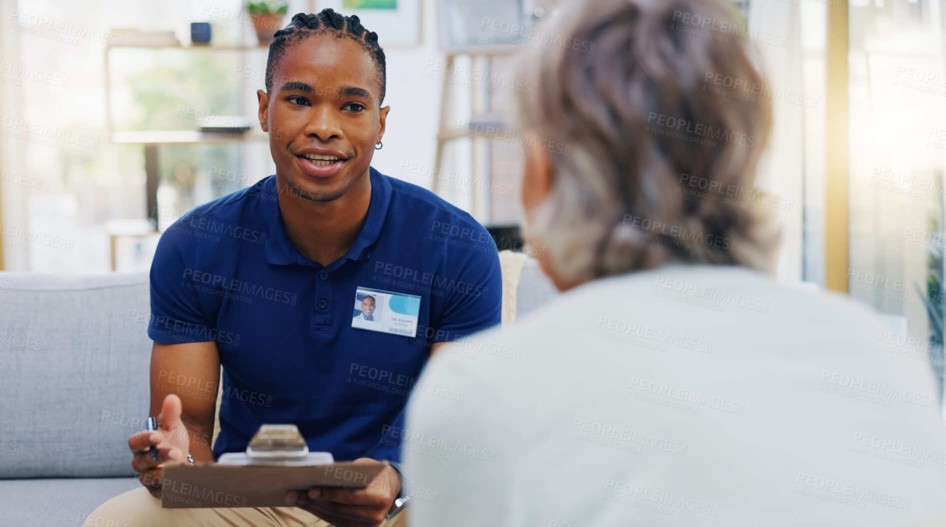 Buy stock photo Retirement, feedback and a nurse talking to an old woman patient about healthcare in an assisted living facility. Medical, planning and communication with a black man consulting a senior in her home