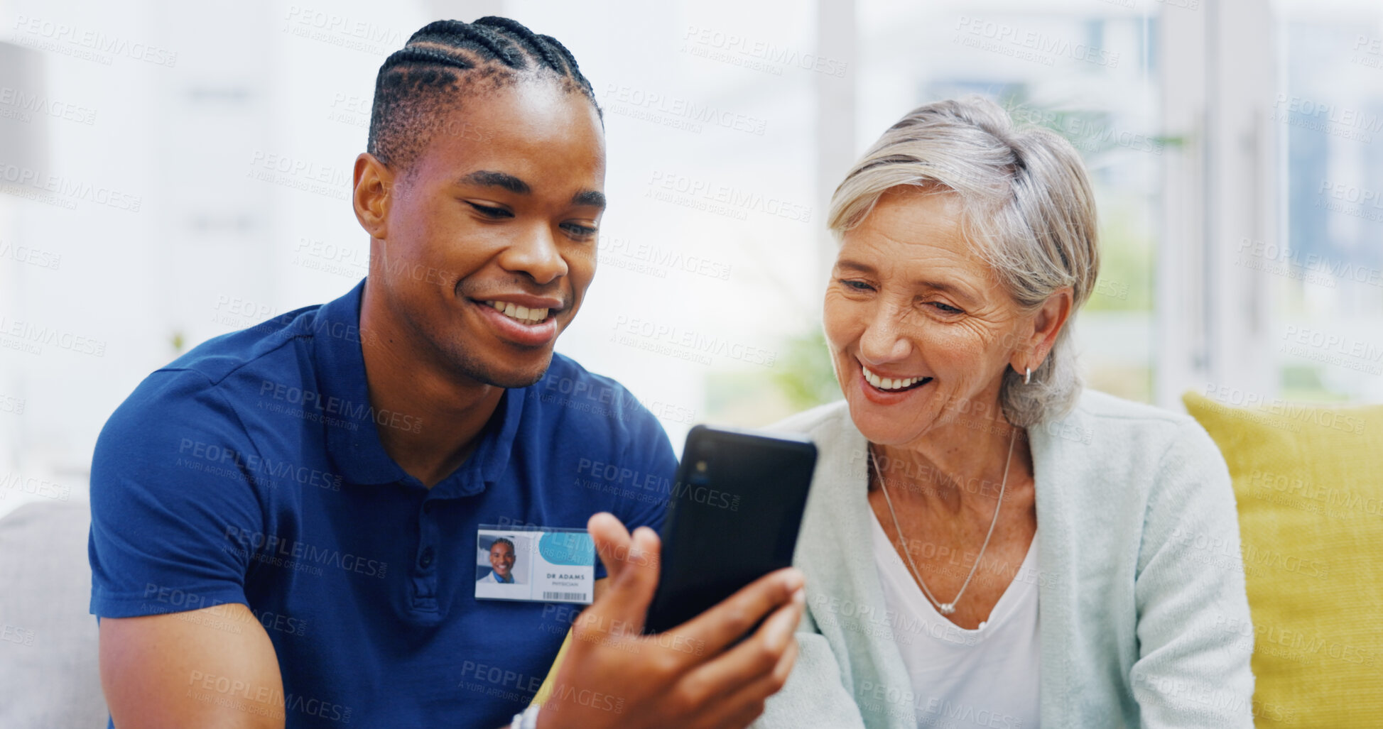 Buy stock photo Phone, medical and a nurse talking to a patient in an assisted living facility for senior people. Healthcare, mobile and contact with a black man medicine professional chatting to a mature woman