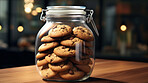 Chocolate chip cookies in glass jar. Fresh homemade sweet snack.