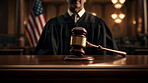 Wooden legal gavel on an office desk or court room, judge's gavel for final verdict