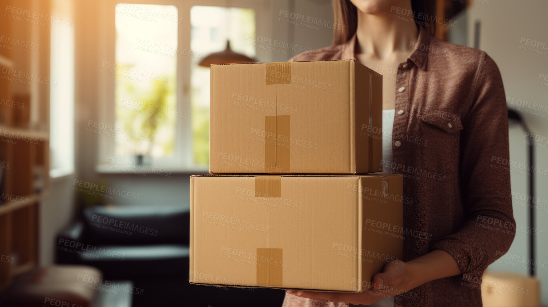 Buy stock photo Young woman carrying large box during a move to new home or package delivery