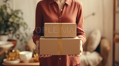 Young woman carrying large box during a move to new home or package delivery