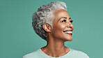 Radiant mature senior model woman with grey hair laughing and smiling for spa and dental